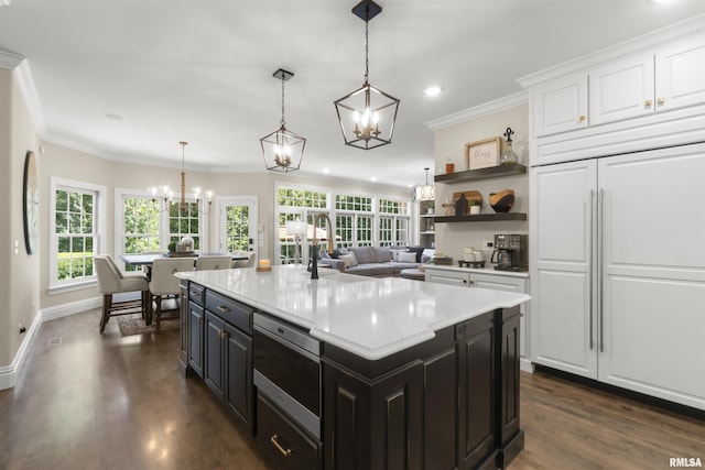 2815 W Windpointe Dr, Peoria, IL 61614 - kitchen featuring a chandelier, white cabinets, crown molding, dark cabinets, and light countertops