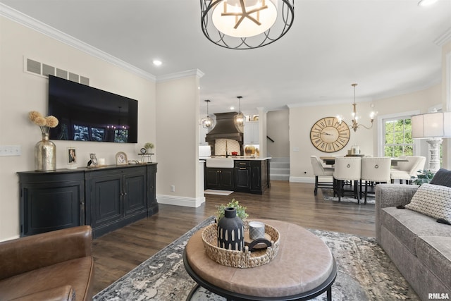 2815 W Windpointe Dr, Peoria, IL 61614 - living area with a chandelier, dark wood-type flooring, ornamental molding, and recessed lighting