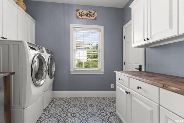 2815 W Windpointe Dr, Peoria, IL 61614 - washroom featuring cabinet space and washer and clothes dryer