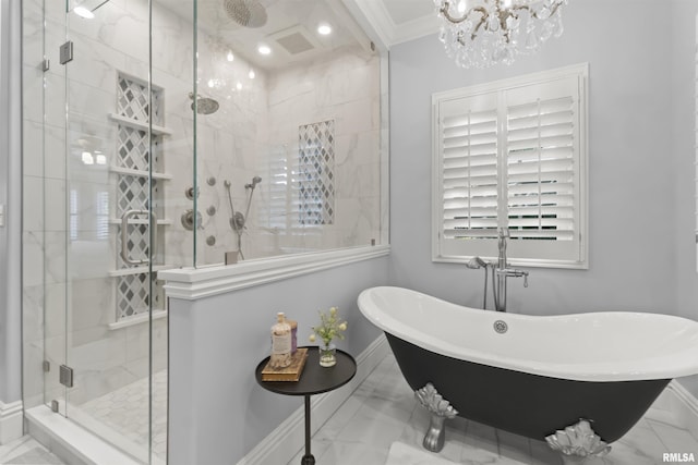 2815 W Windpointe Dr, Peoria, IL 61614 - bathroom featuring marble look tile flooring, a freestanding bath, a shower stall, crown molding, and a chandelier