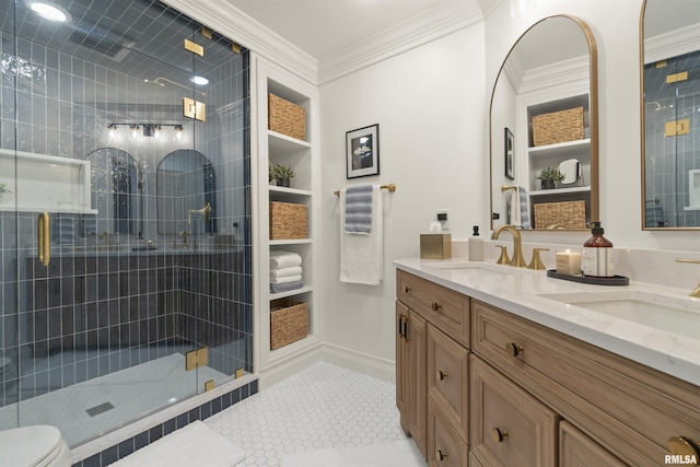 2815 W Windpointe Dr, Peoria, IL 61614 - bathroom featuring double vanity, a shower stall, crown molding, built in shelves, and tile patterned floors