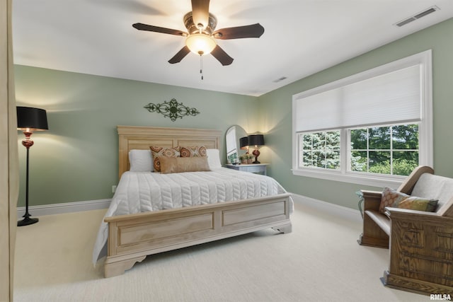 2815 W Windpointe Dr, Peoria, IL 61614 - bedroom with carpet floors and a ceiling fan