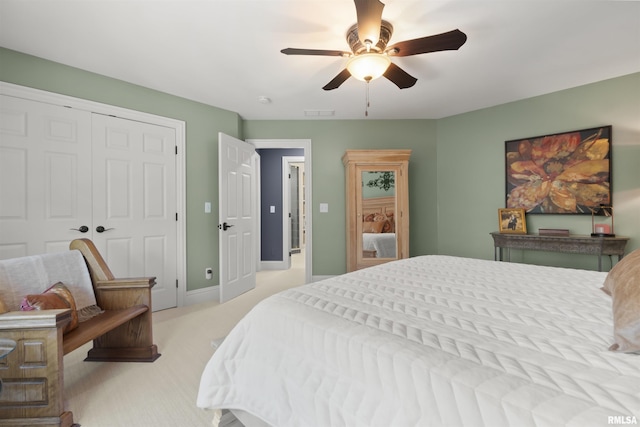 2815 W Windpointe Dr, Peoria, IL 61614 - bedroom with carpet floors, a closet, and ceiling fan