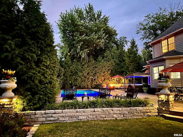 2815 W Windpointe Dr, Peoria, IL 61614 - view of yard featuring a patio and an outdoor pool