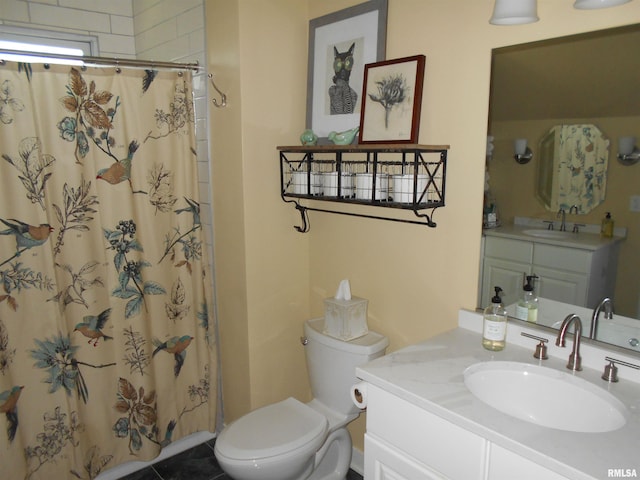 994 N Crafford St, Bushnell, IL 61422 - bathroom with vanity and a shower with shower curtain