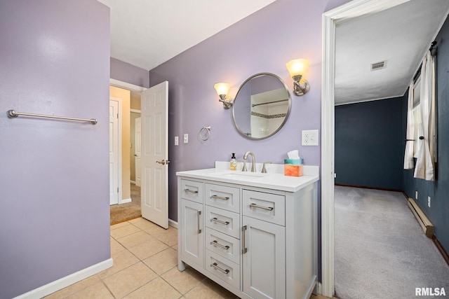 524 Crestview Dr, Metamora, IL 61548 - full bathroom featuring a baseboard radiator, vanity, and tile patterned flooring