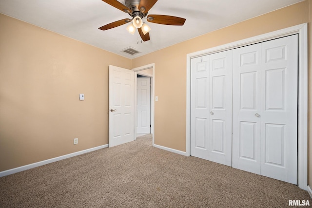 524 Crestview Dr, Metamora, IL 61548 - unfurnished bedroom featuring carpet flooring, a closet, and a ceiling fan
