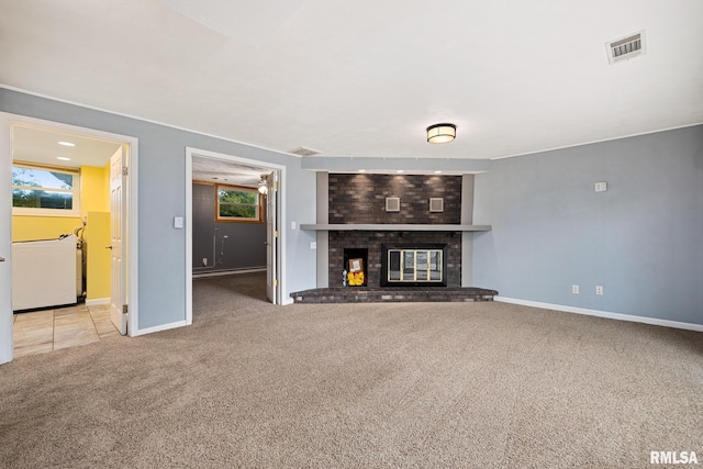 524 Crestview Dr, Metamora, IL 61548 - unfurnished living room featuring carpet flooring and a fireplace