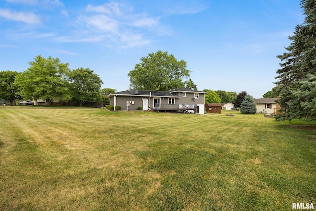 524 Crestview Dr, Metamora, IL 61548 - view of grassy yard featuring a wooden deck