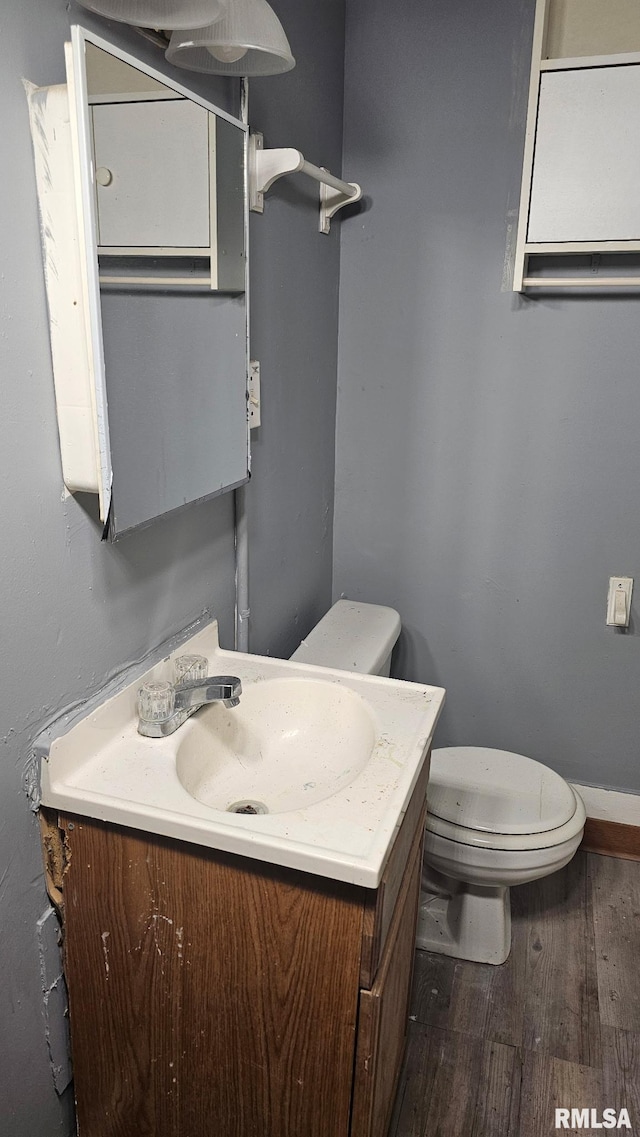 1509 S Western Ave, Peoria, IL 61605 - bathroom featuring vanity and wood finished floors