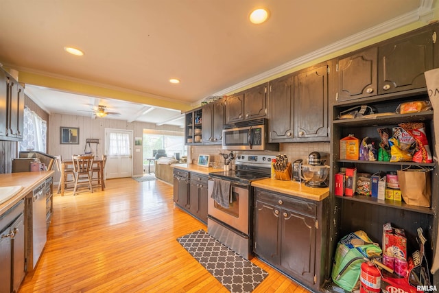 1922 W Rohmann Ave, West Peoria, IL 61604 - kitchen with appliances with stainless steel finishes, ceiling fan, light wood-style flooring, open shelves, and ornamental molding
