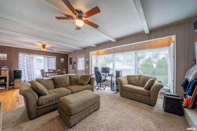 1922 W Rohmann Ave, West Peoria, IL 61604 - living room with beam ceiling, ceiling fan, wood walls, and an office area