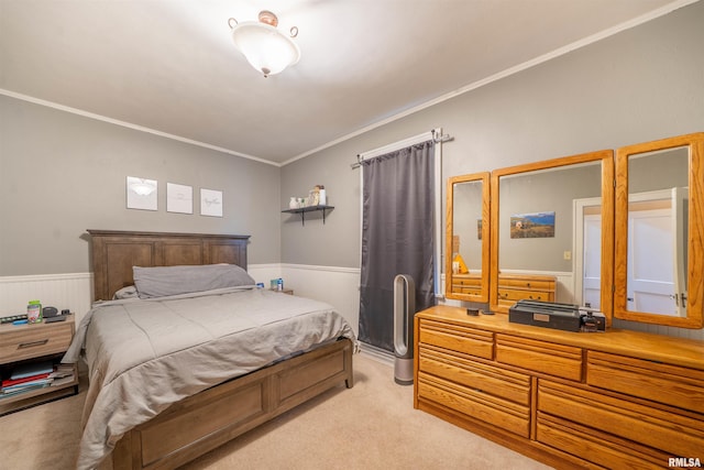 1922 W Rohmann Ave, West Peoria, IL 61604 - bedroom with light carpet, a wainscoted wall, and ornamental molding