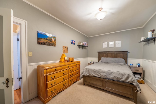 1922 W Rohmann Ave, West Peoria, IL 61604 - bedroom featuring a wainscoted wall, light carpet, and ornamental molding