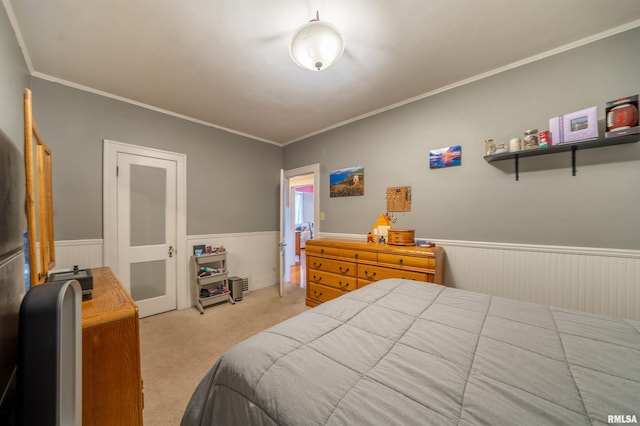 1922 W Rohmann Ave, West Peoria, IL 61604 - carpeted bedroom featuring wainscoting and crown molding