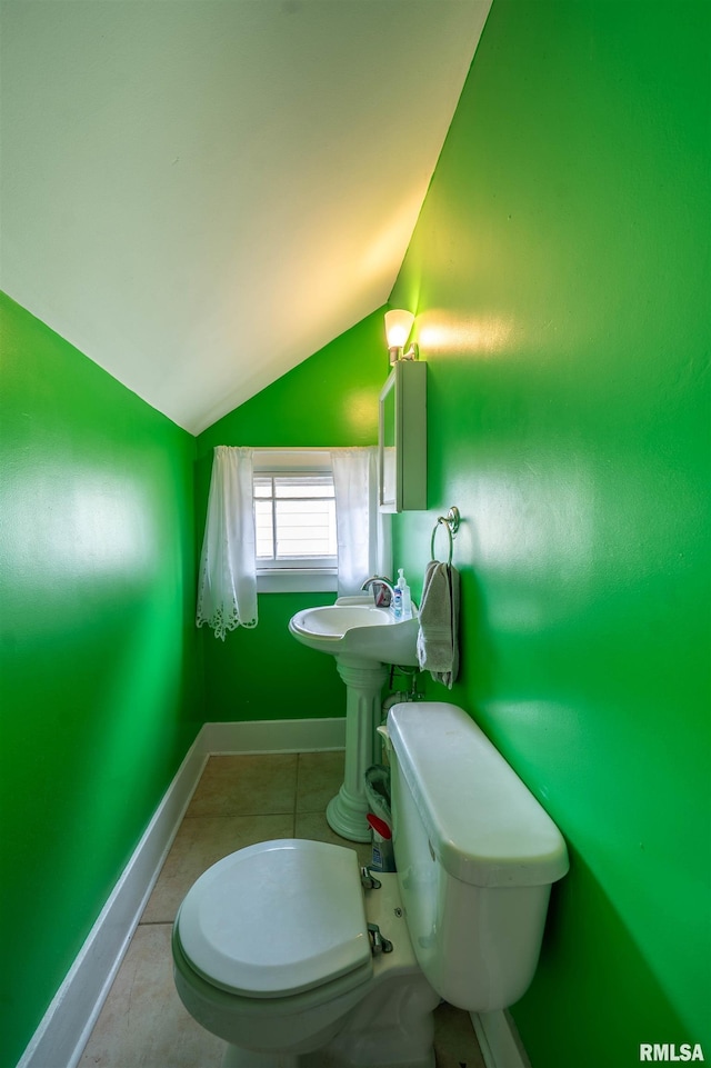 1922 W Rohmann Ave, West Peoria, IL 61604 - bathroom with lofted ceiling and toilet