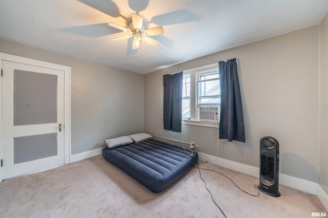 1922 W Rohmann Ave, West Peoria, IL 61604 - bedroom featuring carpet floors, a ceiling fan, and cooling unit
