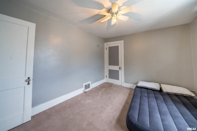 1922 W Rohmann Ave, West Peoria, IL 61604 - unfurnished bedroom with carpet flooring and ceiling fan