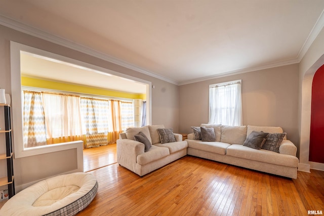 1922 W Rohmann Ave, West Peoria, IL 61604 - living area with wood-type flooring, ornamental molding, and arched walkways