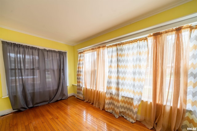 1922 W Rohmann Ave, West Peoria, IL 61604 - unfurnished room with wood-type flooring and crown molding