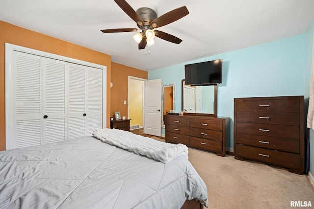 3819 N Saymore Ln, Peoria, IL 61615 - bedroom with a closet, light carpet, and a ceiling fan