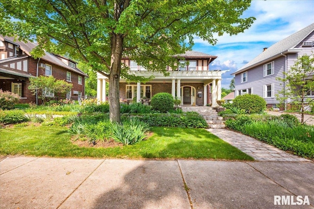 1027 N Maplewood Ave, Peoria, IL 61606 - view of front of home with covered porch and a front lawn