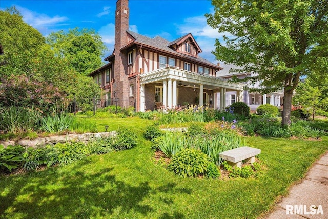 1027 N Maplewood Ave, Peoria, IL 61606 - view of front facade with a chimney