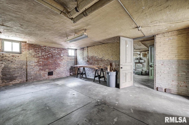 1027 N Maplewood Ave, Peoria, IL 61606 - below grade area featuring brick wall