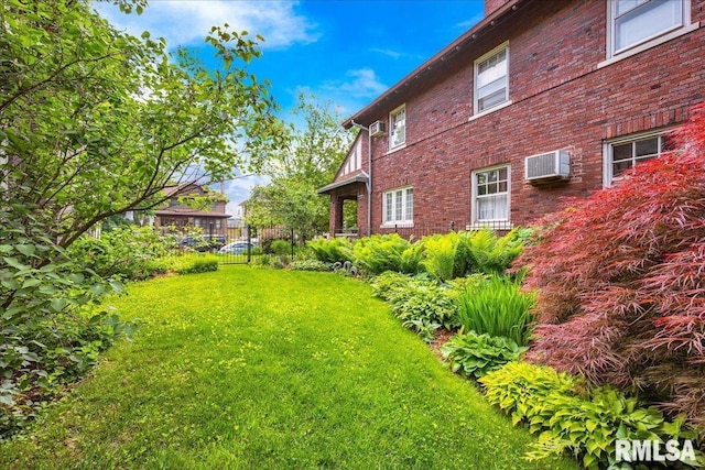 1027 N Maplewood Ave, Peoria, IL 61606 - view of yard featuring an AC wall unit