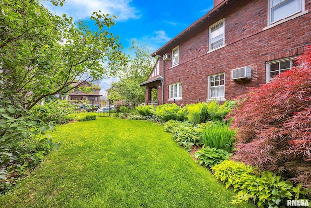 1027 N Maplewood Ave, Peoria, IL 61606 - view of yard featuring a wall mounted AC