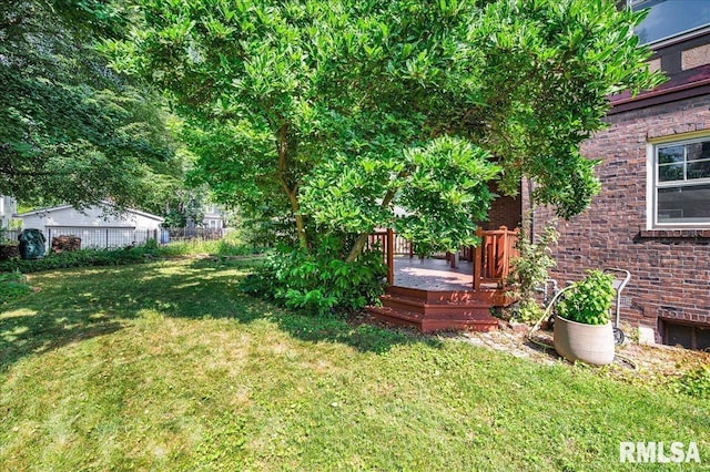 1027 N Maplewood Ave, Peoria, IL 61606 - view of yard featuring a wooden deck
