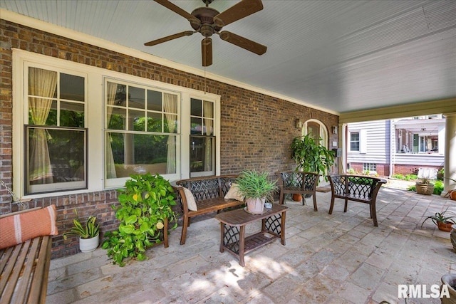 1027 N Maplewood Ave, Peoria, IL 61606 - view of patio featuring a ceiling fan and outdoor lounge area