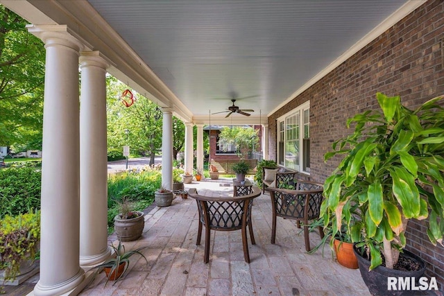 1027 N Maplewood Ave, Peoria, IL 61606 - covered porch with ceiling fan