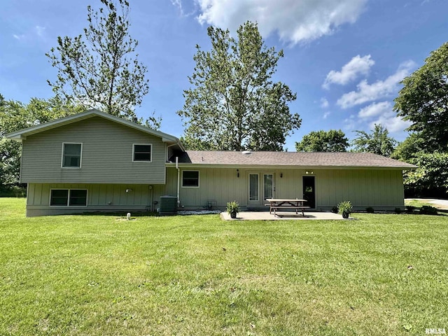 2001 W Jackson St Unit C, Macomb, IL 61455 - back of house featuring a patio area and a lawn
