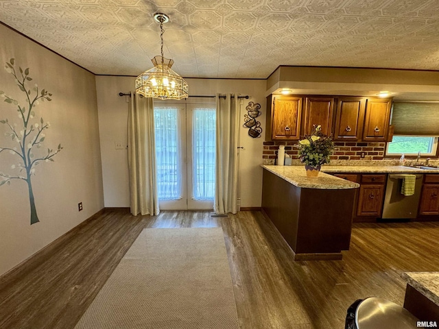 2001 W Jackson St Unit C, Macomb, IL 61455 - kitchen with dishwasher, dark wood finished floors, french doors, a chandelier, and a peninsula
