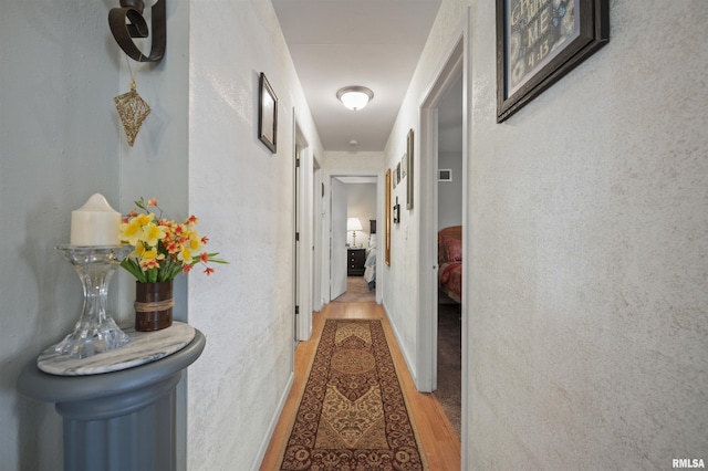 2227 W Westport Rd, Peoria, IL 61615 - hall with wood finished floors