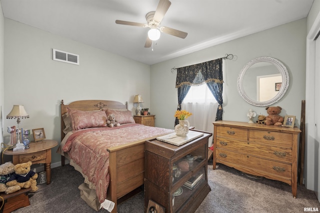 2227 W Westport Rd, Peoria, IL 61615 - bedroom with carpet floors and a ceiling fan