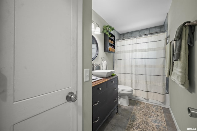 2227 W Westport Rd, Peoria, IL 61615 - bathroom with vanity and shower / bath combo with shower curtain