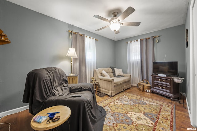 2227 W Westport Rd, Peoria, IL 61615 - living room featuring ceiling fan and wood finished floors