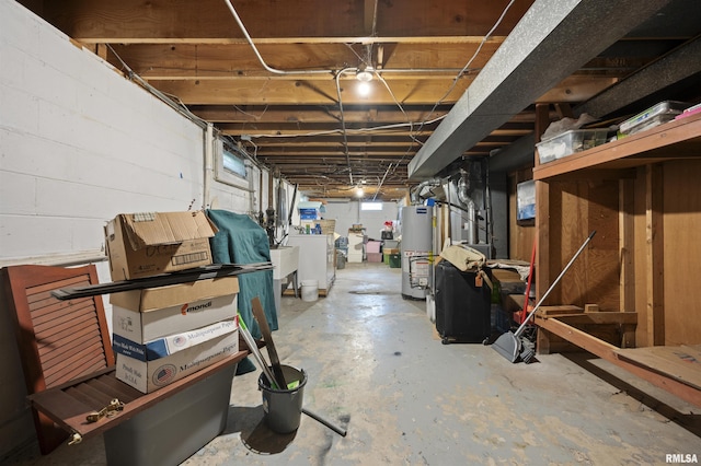 2227 W Westport Rd, Peoria, IL 61615 - basement featuring gas water heater and washer / clothes dryer