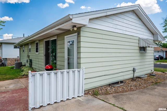 2227 W Westport Rd, Peoria, IL 61615 - view of property exterior featuring a central air condition unit