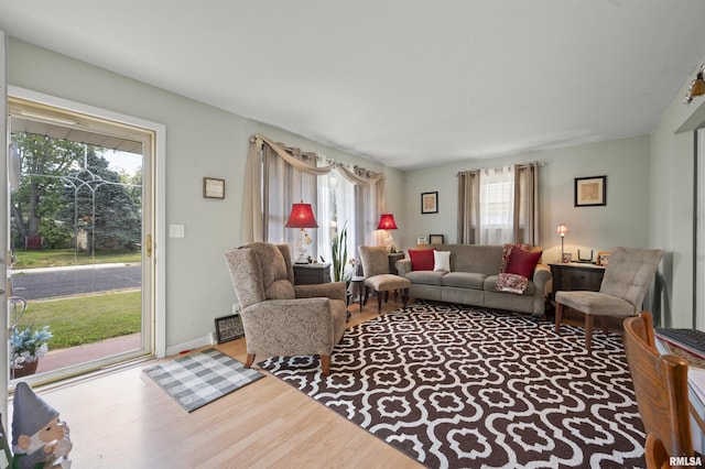 2227 W Westport Rd, Peoria, IL 61615 - living room featuring wood finished floors and baseboards