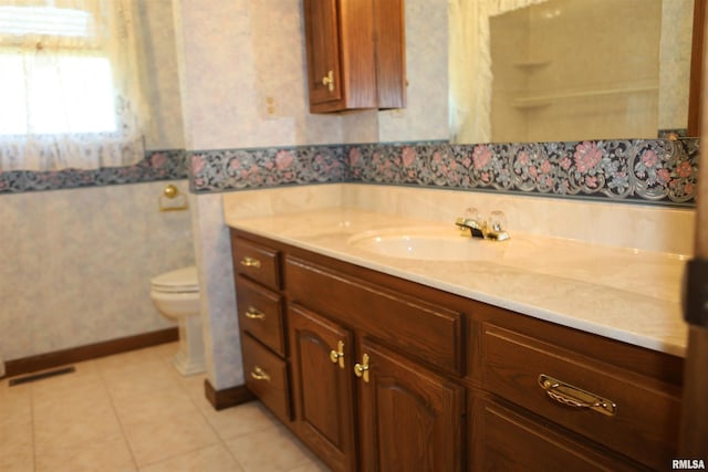 307 N Toepfer St, Tremont, IL 61568 - bathroom featuring vanity, wallpapered walls, and tile patterned floors