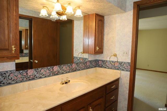 307 N Toepfer St, Tremont, IL 61568 - bathroom featuring vanity and a chandelier