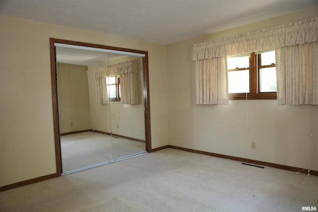 307 N Toepfer St, Tremont, IL 61568 - unfurnished room with carpet flooring and a chandelier