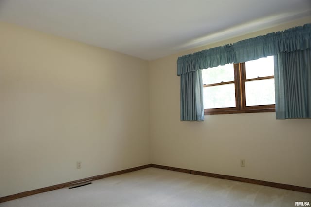 307 N Toepfer St, Tremont, IL 61568 - empty room featuring light carpet and baseboards