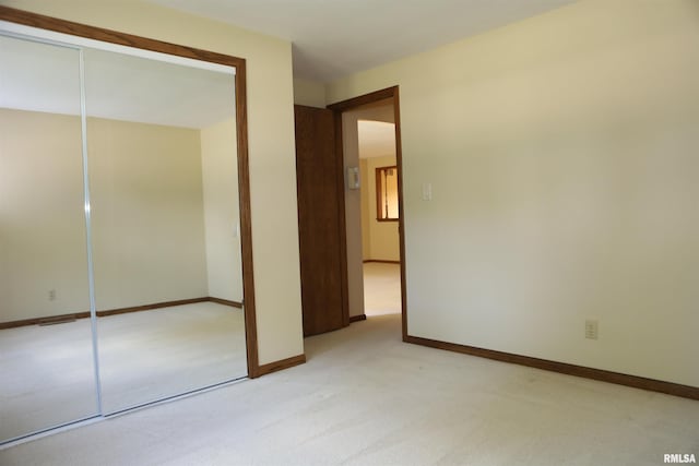 307 N Toepfer St, Tremont, IL 61568 - unfurnished bedroom featuring a closet and light carpet