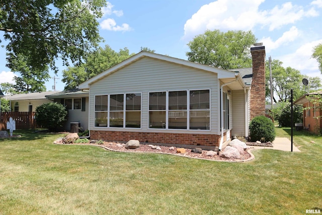 307 N Toepfer St, Tremont, IL 61568 - back of house with brick siding and a chimney