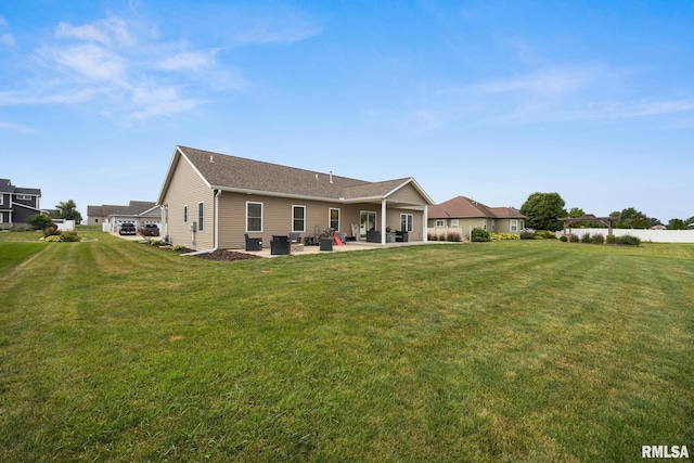 109 E Lee St, Tremont, IL 61568 - rear view of house with a patio area and a lawn