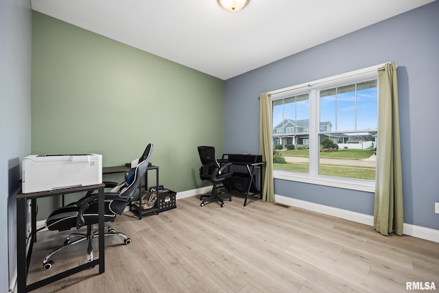 109 E Lee St, Tremont, IL 61568 - home office with baseboards and wood finished floors